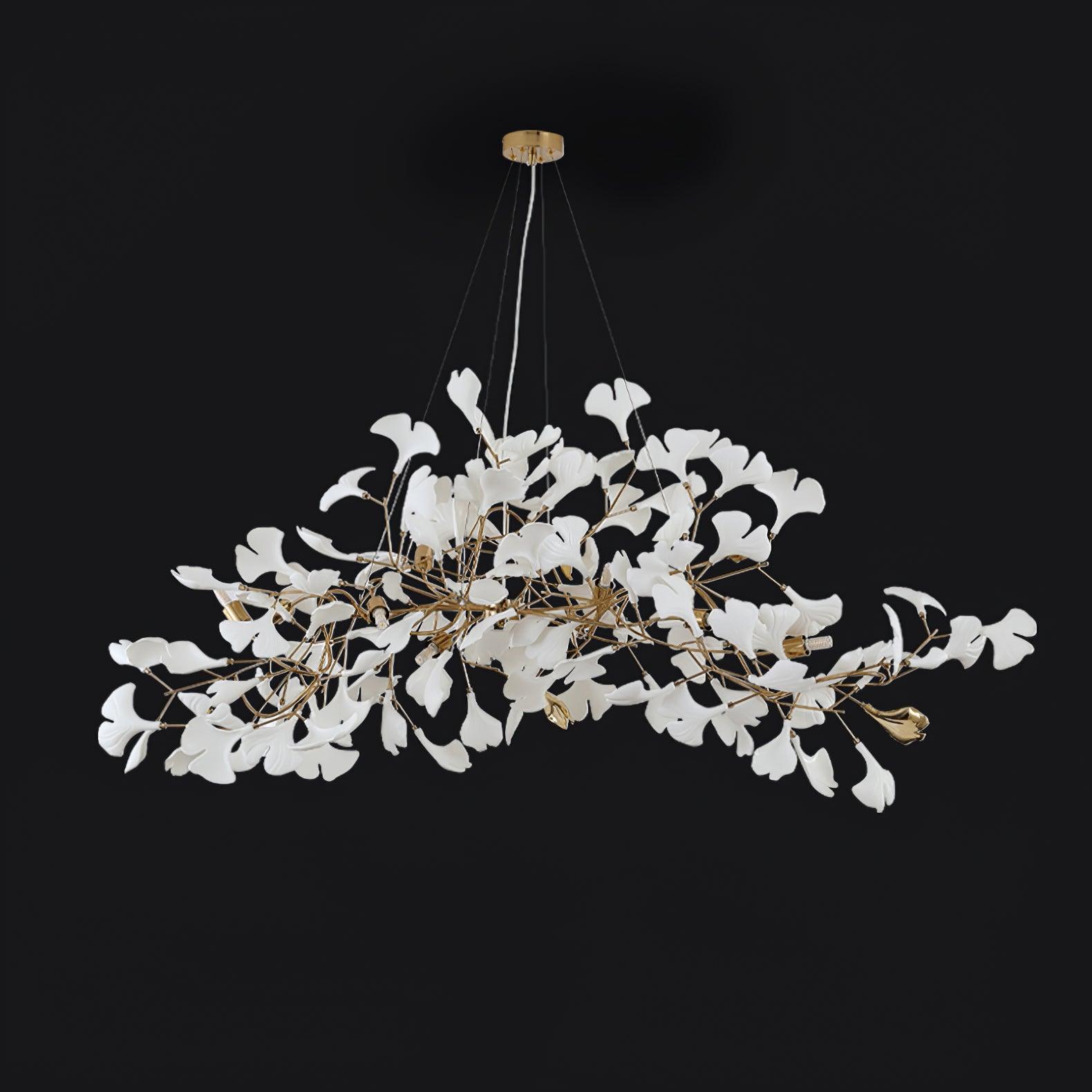 Porcelain leaf chandelier suspended over a set table