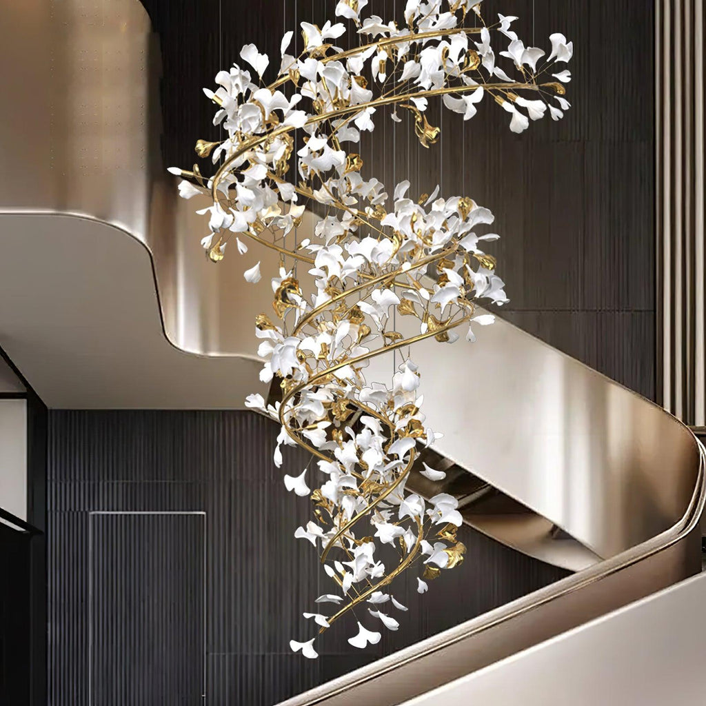 The gingko column hung against dark panelling, its leaves reflected in a curved brushed-gold balustrade.
