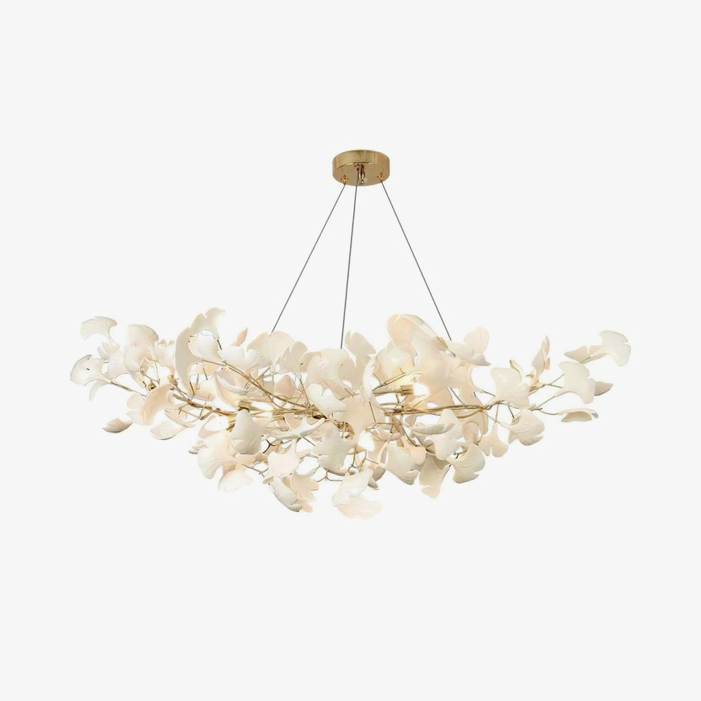 Porcelain gingko chandelier glowing softly in a sophisticated space