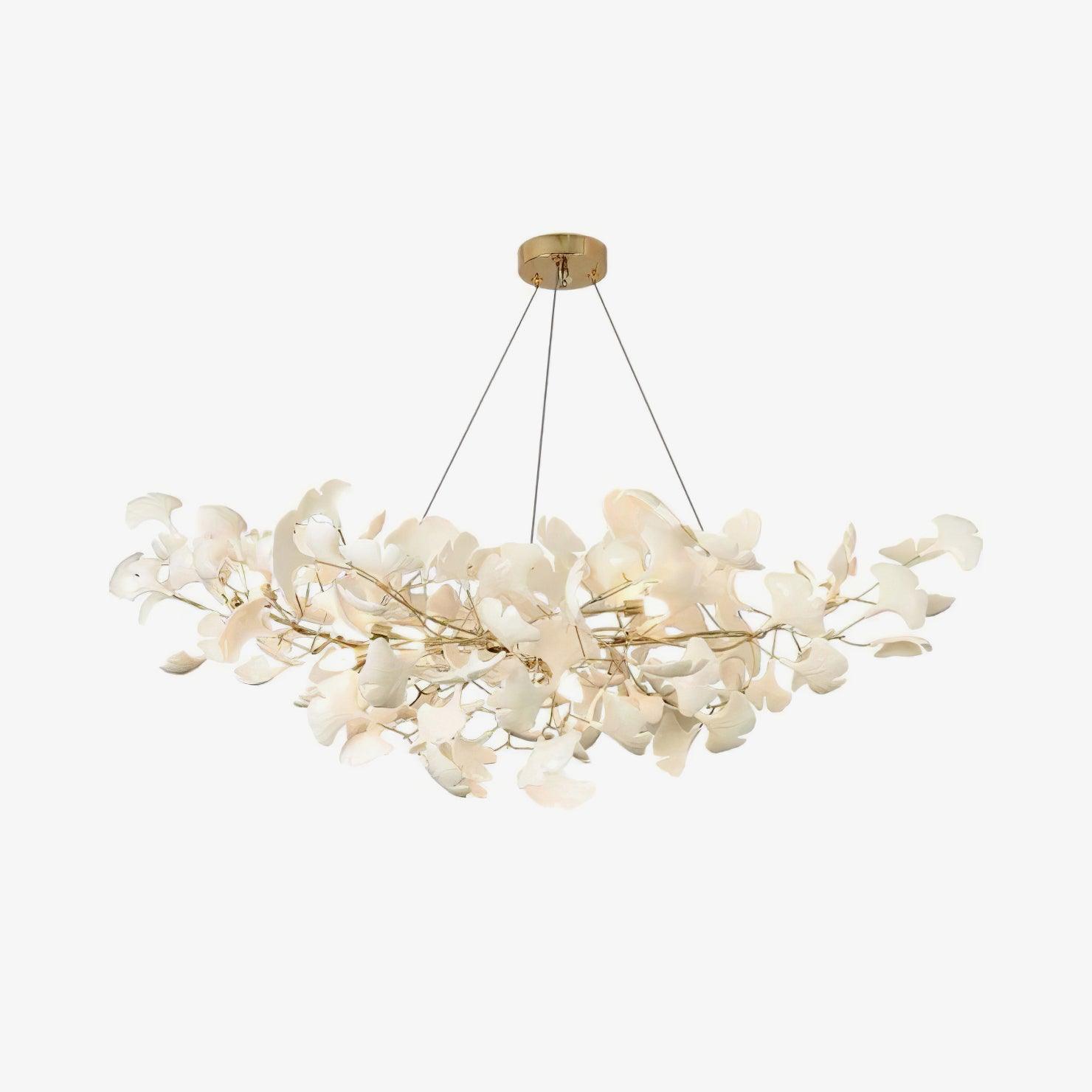 Porcelain gingko chandelier glowing softly in a sophisticated space