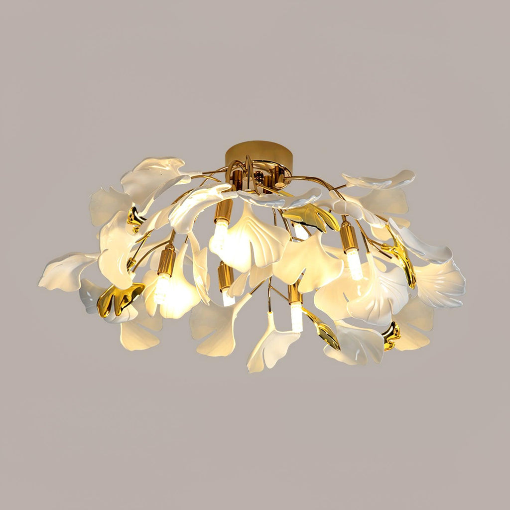 Ginkgo leaf ceiling light glowing warmly over a living space