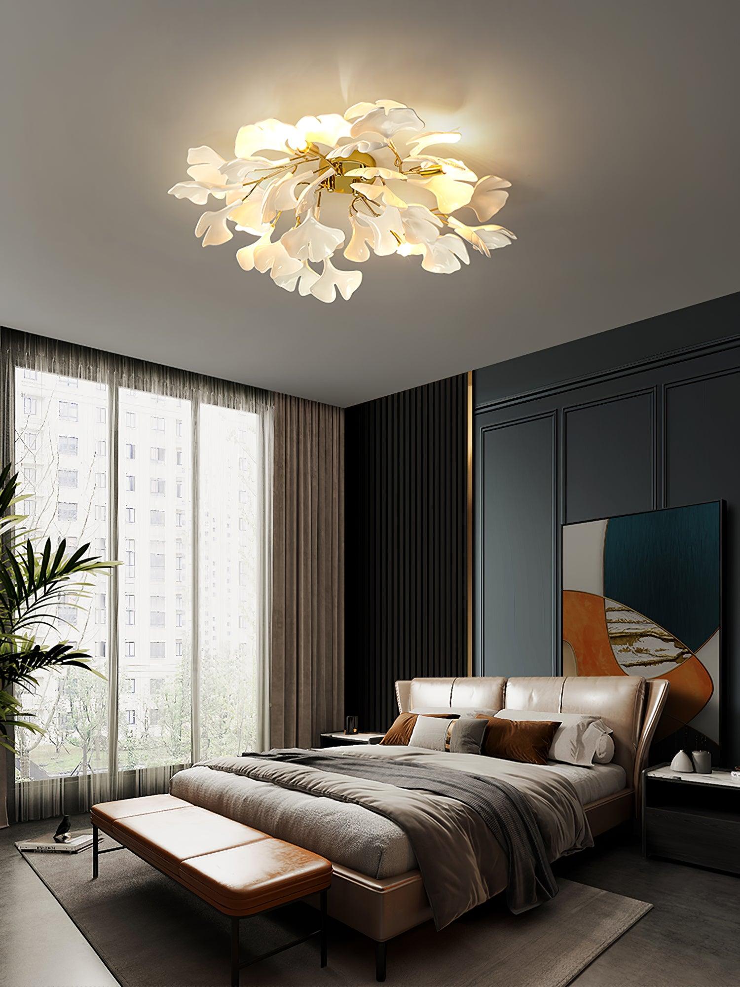 Ceramic ginkgo leaf ceiling light glowing in a warm interior