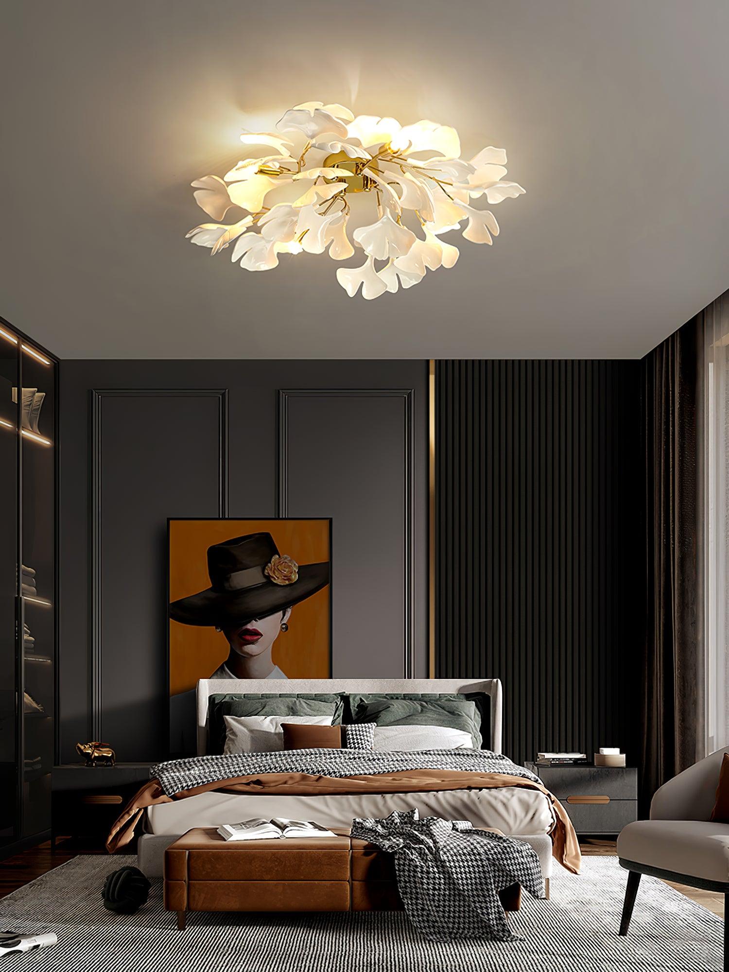 Warm-lit ceramic ginkgo leaf ceiling fixture from below