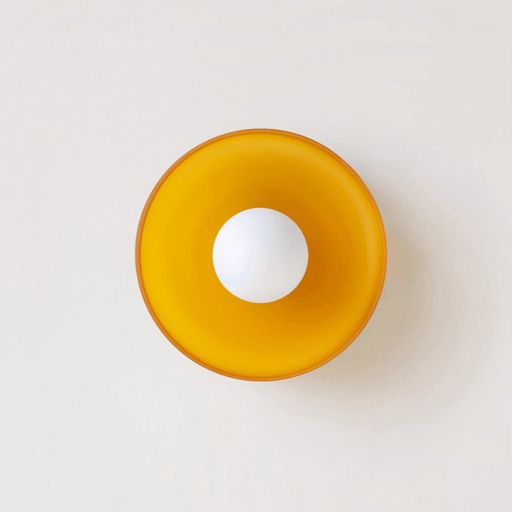 A white disc-shaped wall light, a different mount from this Clérachic ceiling light.
