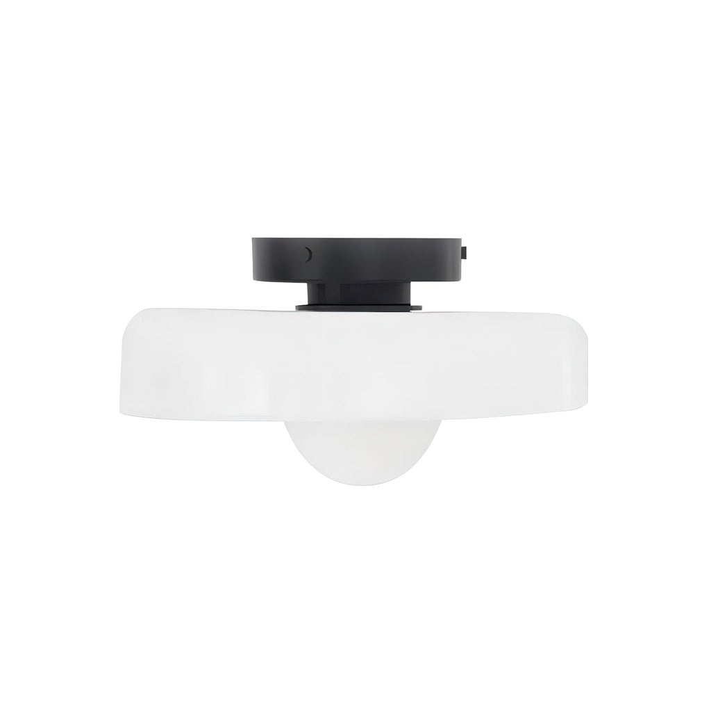 A flattened white flush-mount light with an oval shade, a different design from this Clérachic ceiling light.