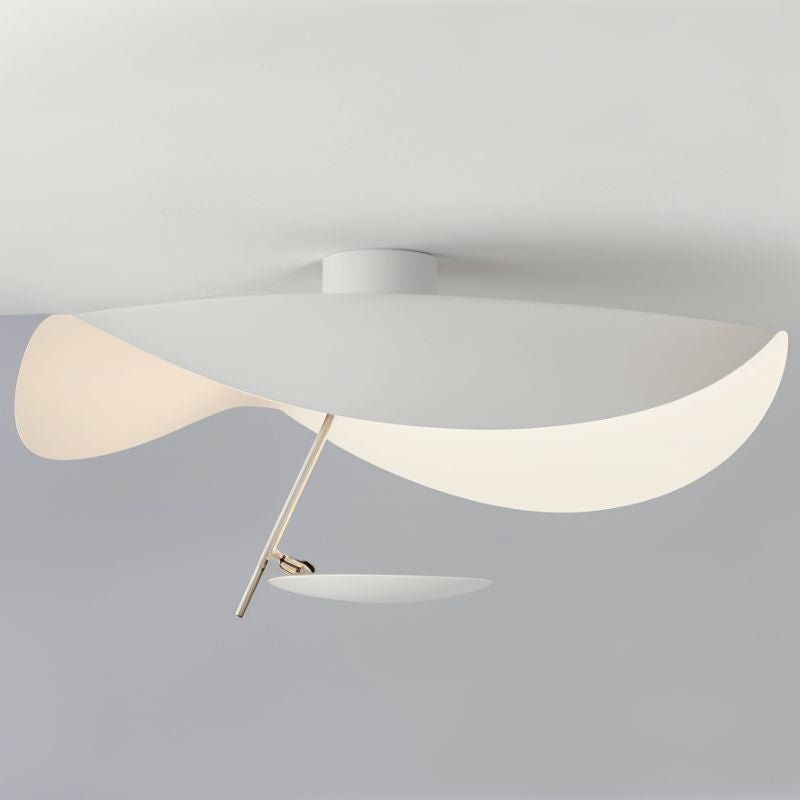 Curved disc ceiling light shown from a low angle