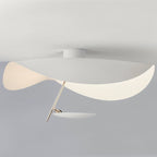 Curved disc ceiling light shown from a low angle
