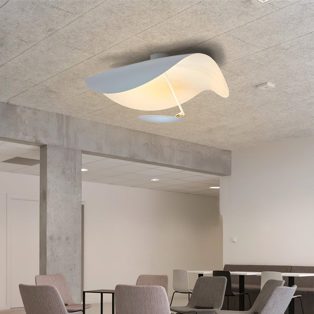 Curved disc ceiling light with a soft downward glow