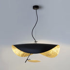 Curved disc pendant light with slim arm and warm glow