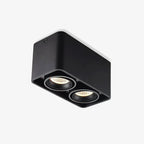 This black two-light Clérachic spotlight is shown unlit from a different angle against a plain background.