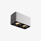 This white two-light Clérachic spotlight is shown unlit at an angle on a plain white background.