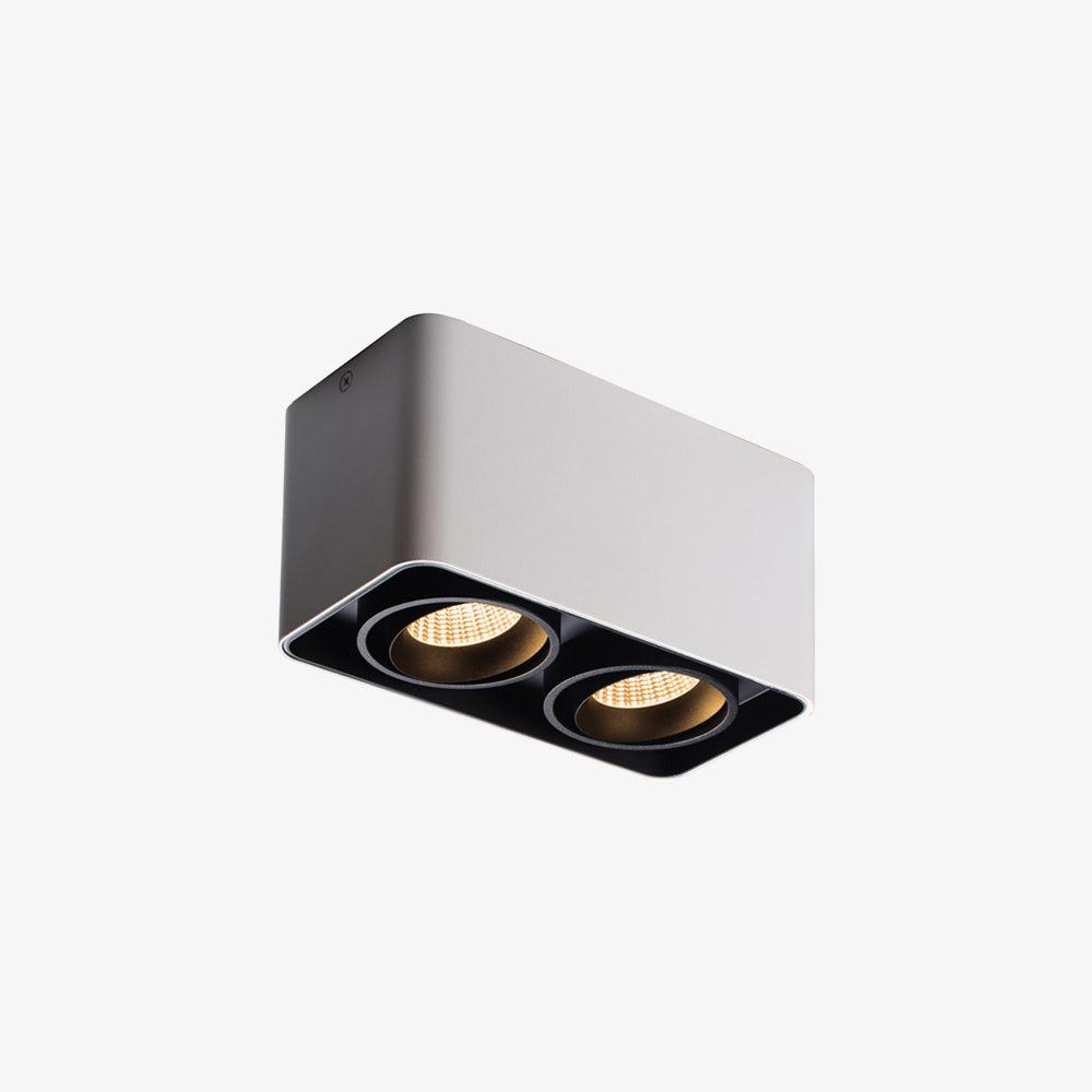 This white two-light Clérachic spotlight is shown unlit at an angle on a plain white background.