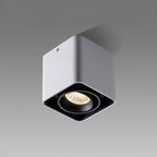 This white single-light Clérachic spotlight is shown unlit at an angle against a plain white background.