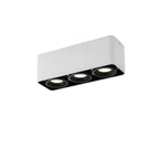 This white three-light Clérachic spotlight is shown unlit from a different angle on a plain white background.