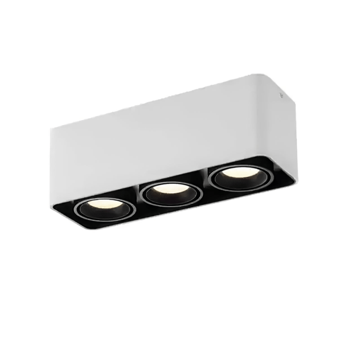 This white three-light Clérachic spotlight is shown unlit at an angle on a plain white background.