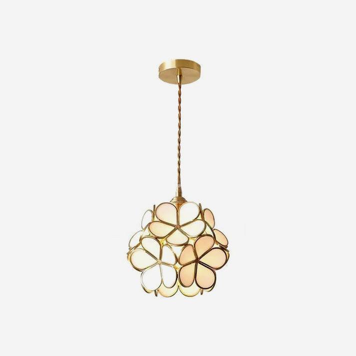 Glass petal pendant lights clustered with warm brass fittings