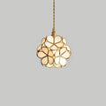 Cluster of coloured glass petal pendant lights at varied heights