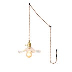 Plug-in hibiscus swag light with warm filament bulb glow