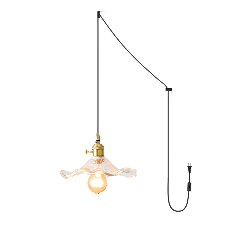 Fluted glass hibiscus swag light against a soft backdrop