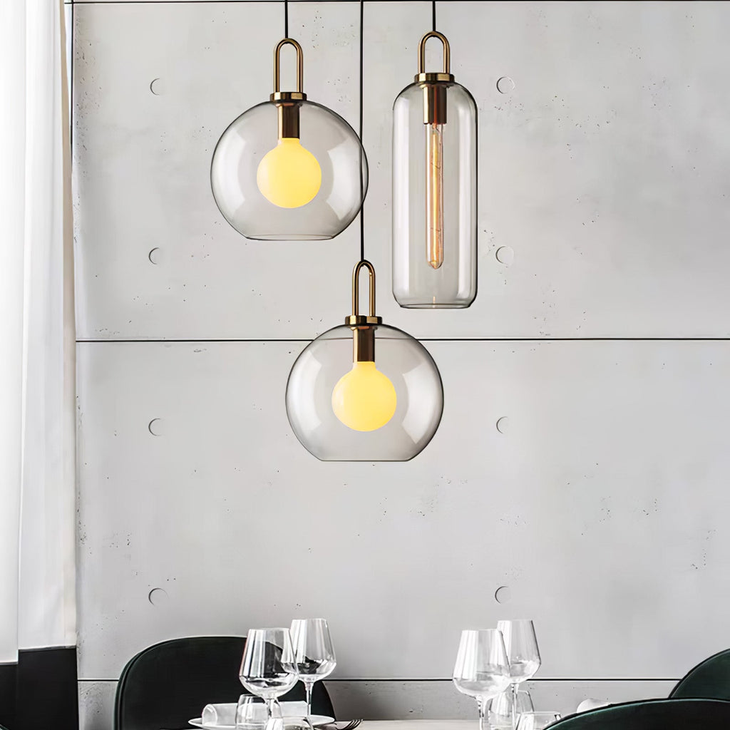 Glass pendant light shade detail showing copper-plated cap
