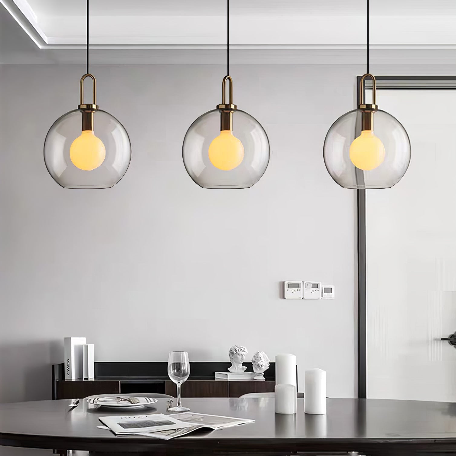 Glass pendant light cluster mixing capsule and sphere shapes