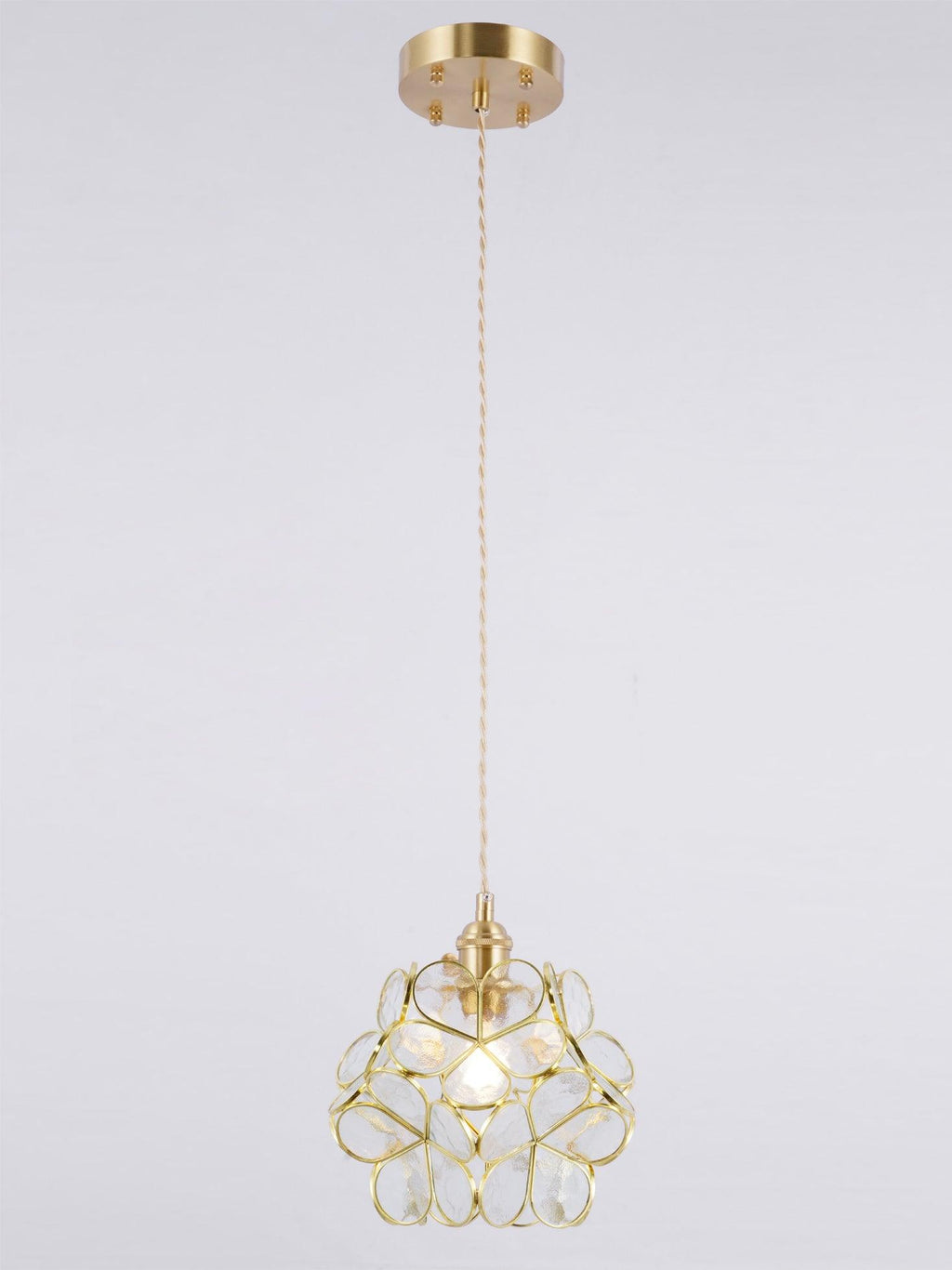 White glass petal pendant light with brass suspension fitting
