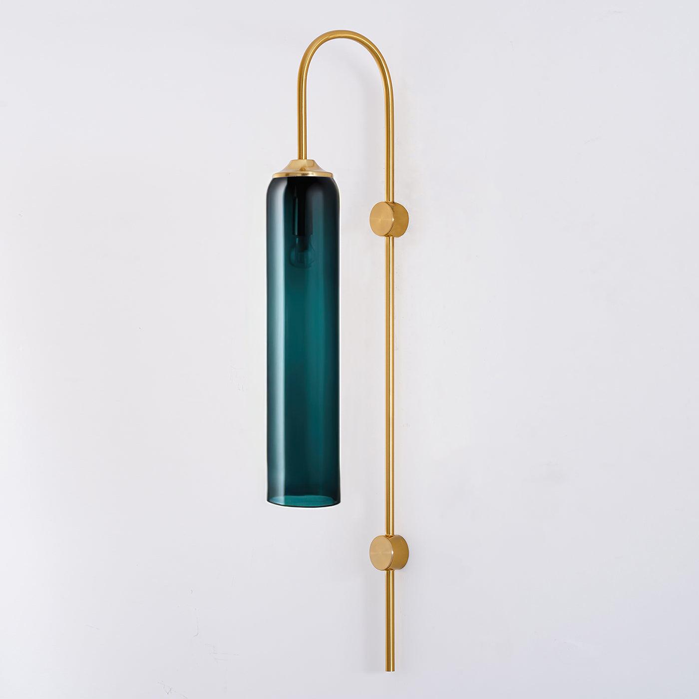 Glass wall sconce with sky blue glass shade