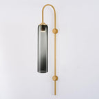Glass wall sconce with smoke grey glass shade