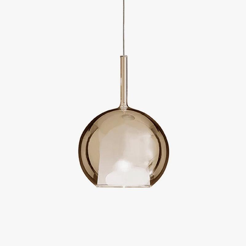 Glo glass globe pendant light shown against a pale wall
