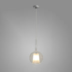 Amber glass globe pendant light with sculptural warm glow