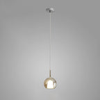 Tinted blown glass globe pendant light with soft warm glow