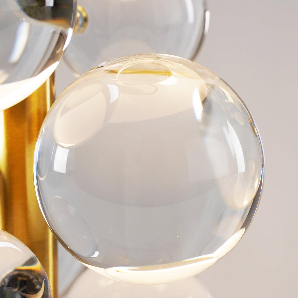 Multicolor glass spheres glowing on the Globo table lamp