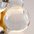 Multicolor glass spheres glowing on the Globo table lamp
