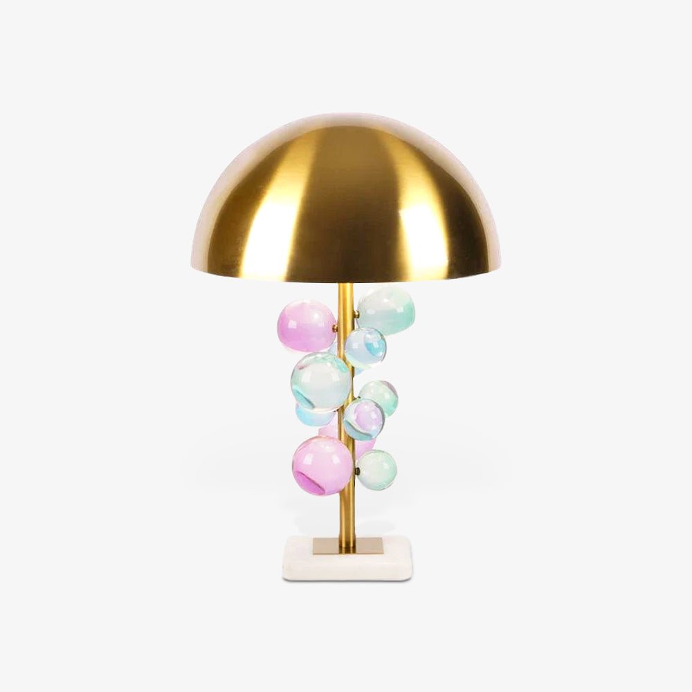 Globo glass sphere table lamp styled on a console table