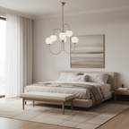 Gooseneck chandelier arms sweeping outward to glass globes