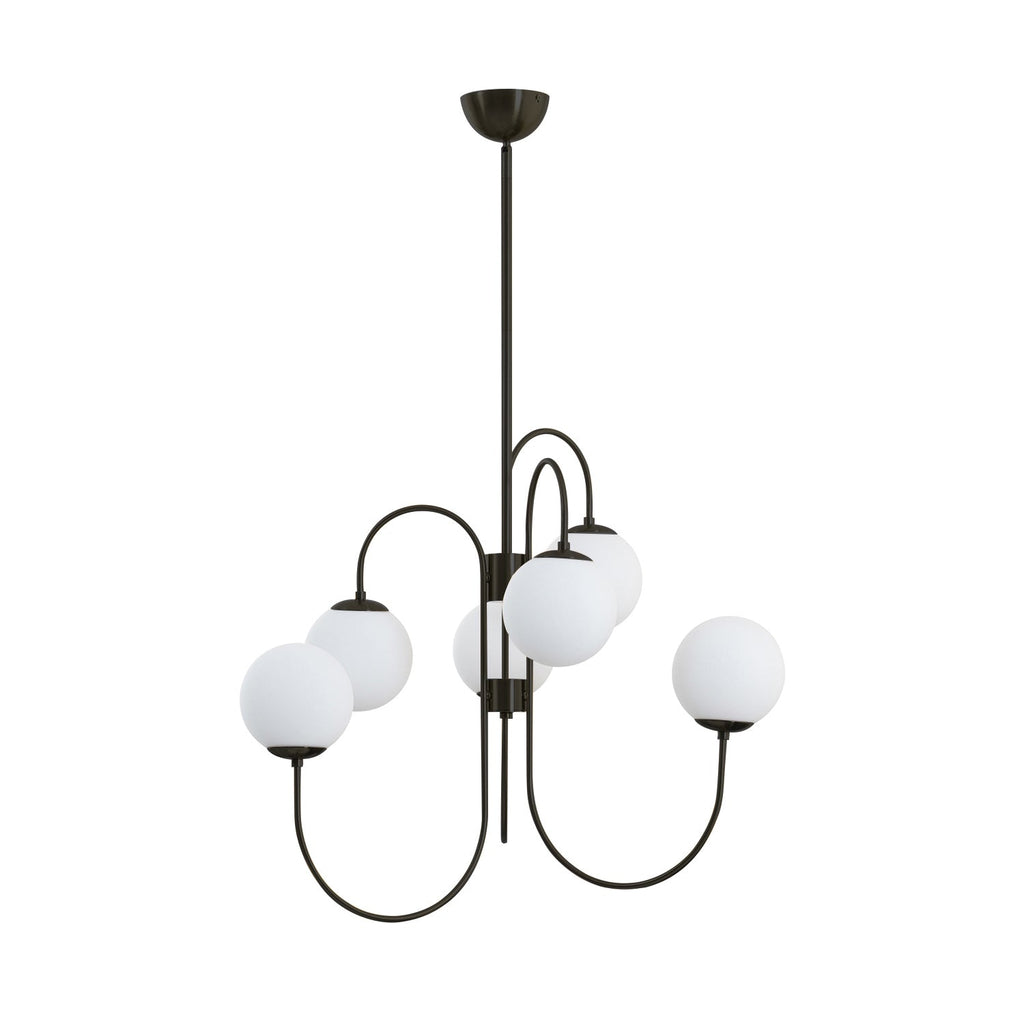 Gooseneck chandelier with white glass globes lit warmly
