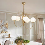 Curved-arm gooseneck chandelier suspended in a living room