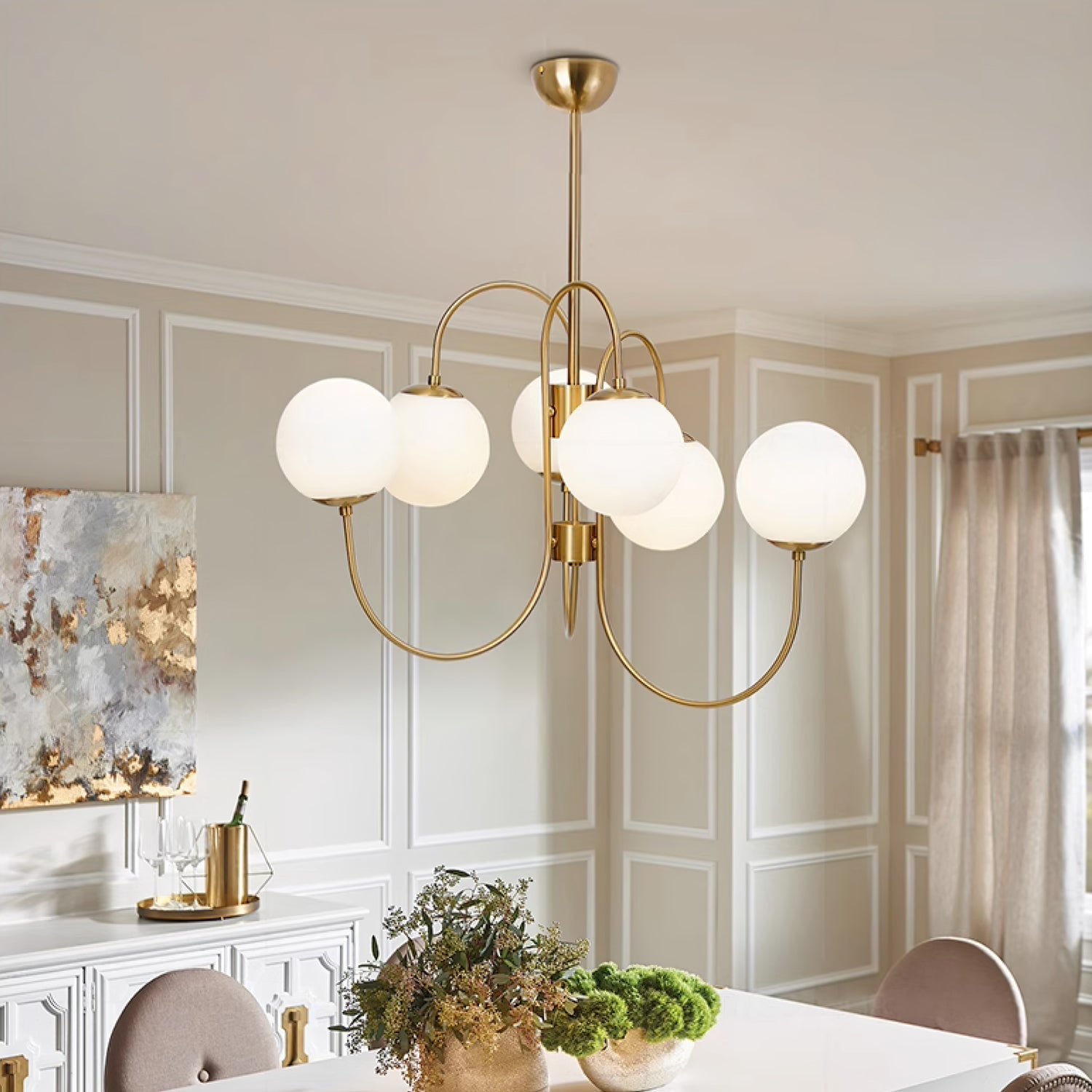 Curved-arm gooseneck chandelier suspended in a living room