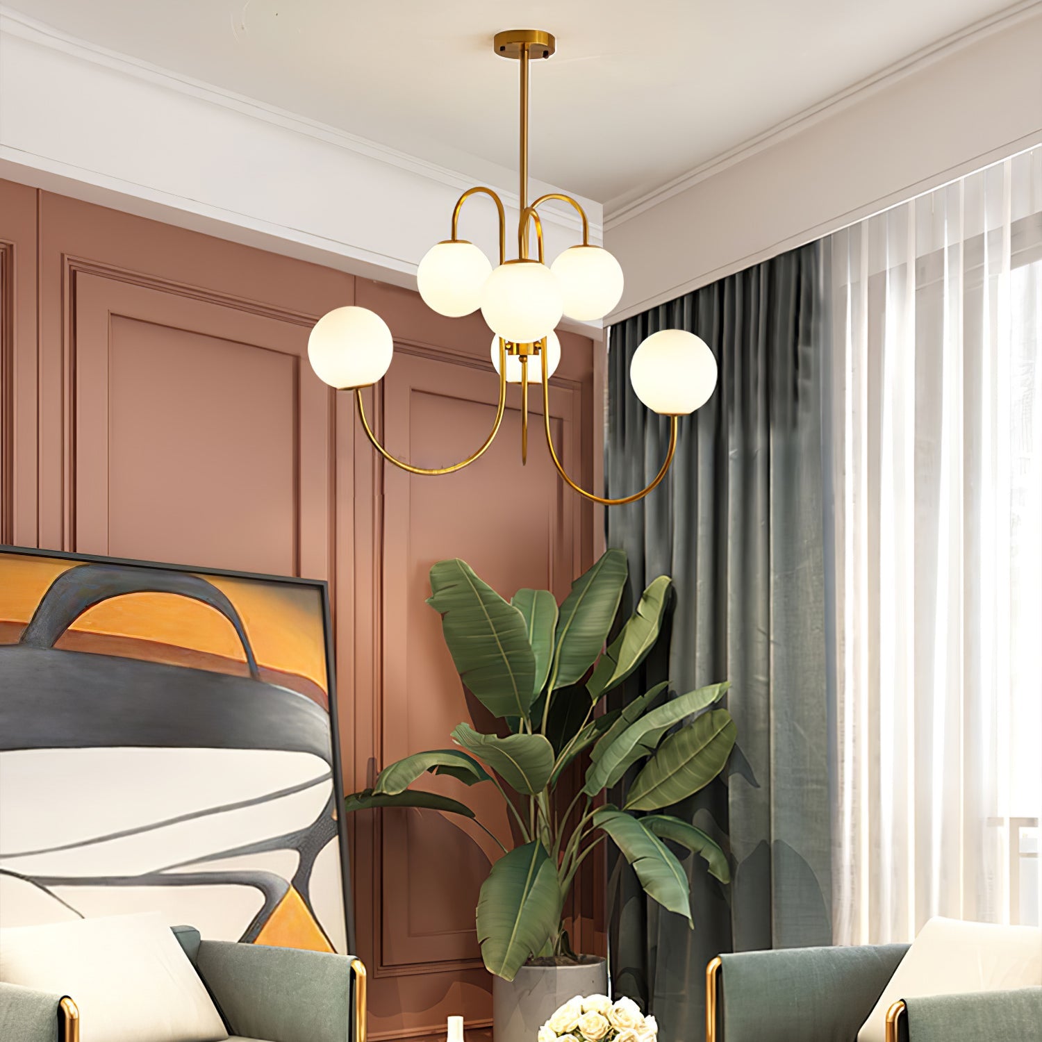 Gooseneck chandelier glowing warm above a styled table