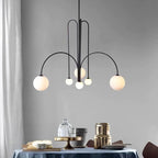 Gran Finale pendant light detail with glass shade and metal arm