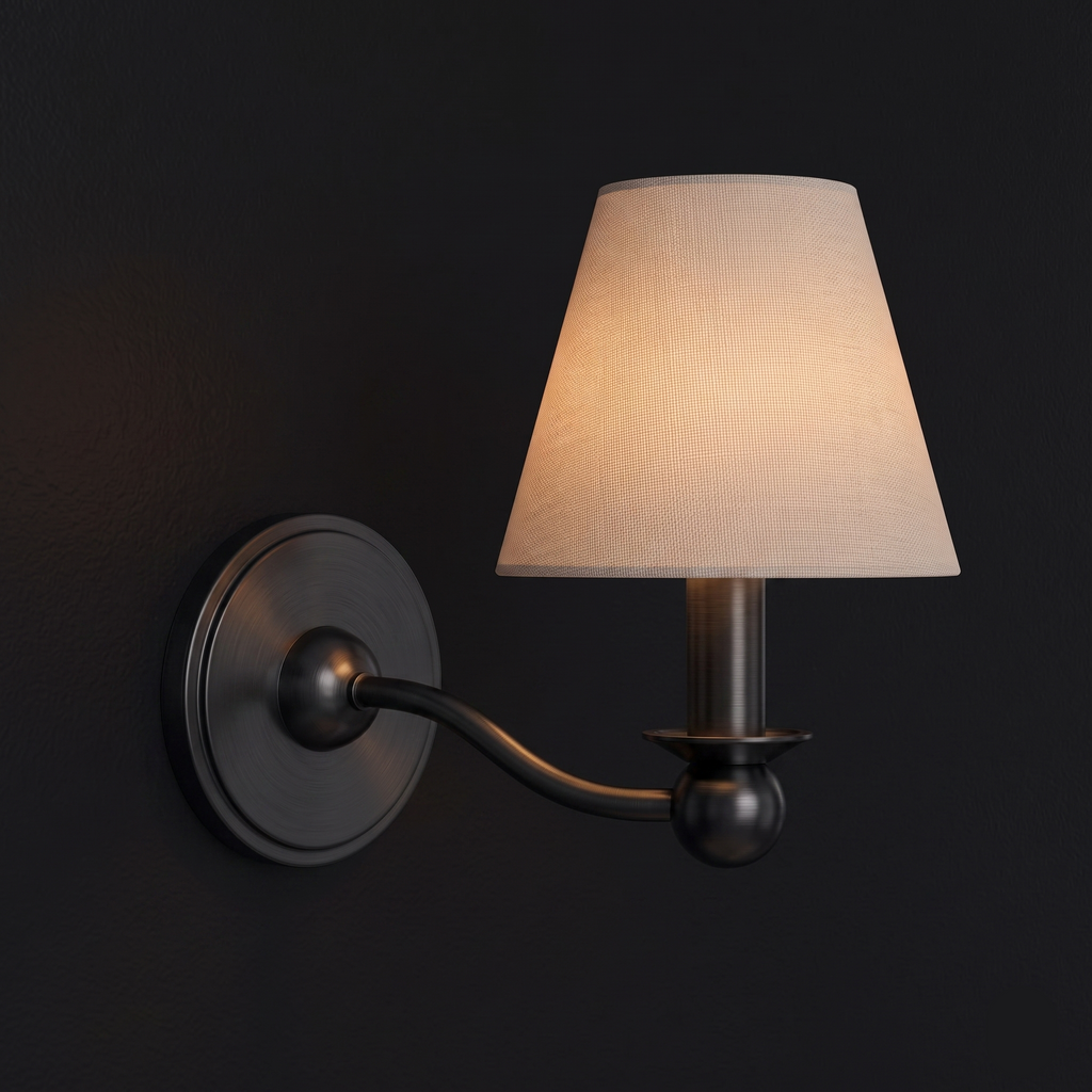 This single-arm Clérachic wall sconce in matte black stands unlit against a dark backdrop.