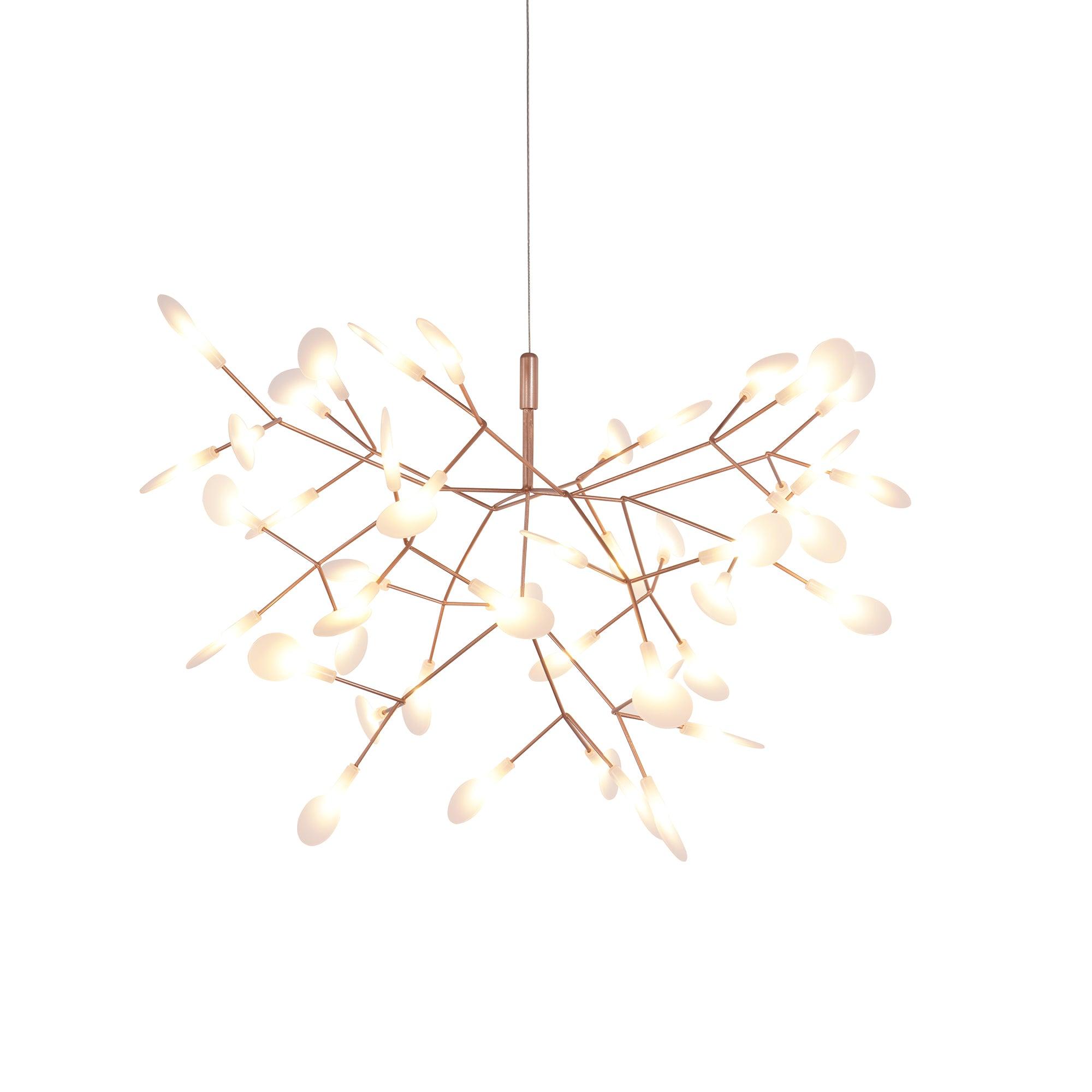 Rose gold chandelier with white polycarbonate leaves glowing