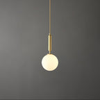 Against the same dark grey backdrop, a brass-and-white Clérachic sphere pendant hangs lit.