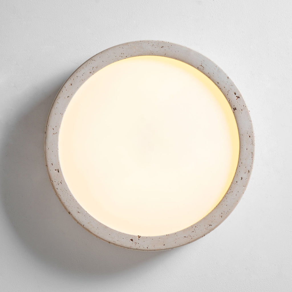 Seen face-on and lit, this Clérachic ceiling light glows warmly across its full white centre panel.