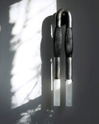 Horsehair wall lamp casting warm light from a feature wall