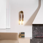 Horsehair wall lamp glowing warm against a neutral wall