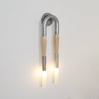 Horsehair wall lamp lit warm as a wall focal point