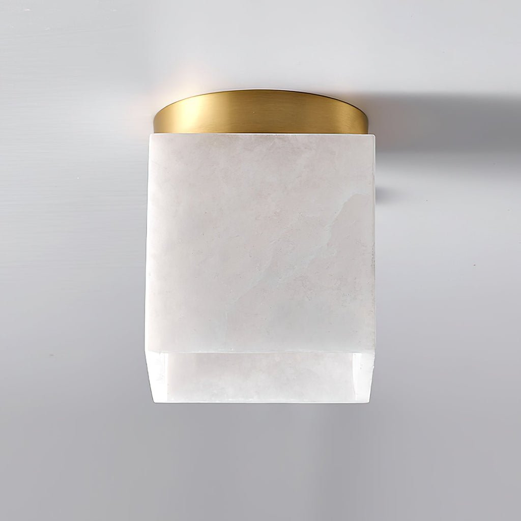 Straight-on view of the Usilia ceiling light, unlit, the round brass canopy above the square alabaster shade.