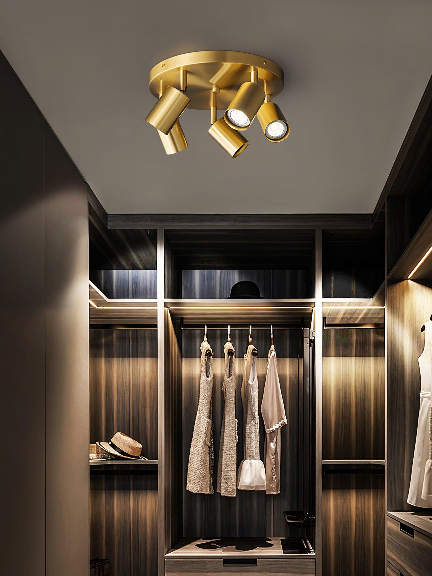 Spotlight ceiling light with warm beams over a kitchen counter