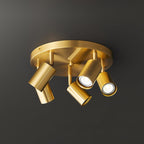Hugo ceiling light with five GU10 spotlight heads lit warm